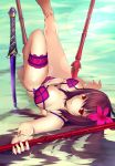  1girl afloat bikini breasts dear_(10956869) fate/grand_order fate_(series) flower gae_bolg hair_flower hair_ornament highres lens_flare long_hair looking_at_viewer lying on_back partially_submerged polearm purple_hair red_eyes scathach_(fate/grand_order) solo spear swimsuit upside-down water weapon 