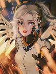 1girl blonde_hair blood blood_on_face blue_eyes bodysuit breasts embers eyeliner high_ponytail highres lips lipstick long_hair looking_at_viewer makeup mechanical_halo mechanical_wings medium_breasts mercy_(overwatch) messy_hair nose overwatch parted_lips ponytail red_lipstick solo tears upper_body wings xiazhengzheng_xzz 