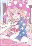  2girls american_flag_shirt bed blanket blonde_hair blush clownpiece fairy_wings fang feeding frilled_shirt_collar frills hat highres jester_cap long_hair long_sleeves multiple_girls nagi_(nagito) open_mouth polka_dot red_eyes sick spoon star star_print sweat touhou translation_request wings 