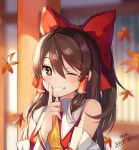  1girl 2016 autumn autumn_leaves bare_shoulders blurry bow breasts cravat day depth_of_field detached_sleeves dr_poapo eyebrows eyebrows_visible_through_hair eyelashes falling_leaves finger_to_mouth grin hair_bow hair_tubes hakurei_reimu index_finger_raised leaf light_particles long_sleeves looking_at_viewer maple_leaf motion_blur one_eye_closed pole red red_bow red_eyes ribbon-trimmed_sleeves ribbon_trim shushing sidelocks signature small_breasts smile solo touhou upper_body wide_sleeves 