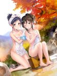  2girls autumn_leaves barefoot black_eyes black_hair blush breasts brown_eyes brown_hair cleavage collarbone covering covering_breasts day dutch_angle fukahire_sanba groin hair_up holding kneeling looking_at_viewer medium_breasts multiple_girls nude one_eye_closed original outdoors parted_lips ponytail rock sitting towel wet 