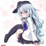  1girl black_legwear black_skirt blue_eyes bottle dd_(ijigendd) flat_cap hat hibiki_(kantai_collection) kantai_collection long_hair looking_at_viewer neckerchief pleated_skirt school_uniform serafuku silver_hair skirt smile solo thigh-highs zettai_ryouiki 