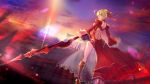  1girl ahoge bare_back blonde_hair dress dutch_angle fate/extra fate_(series) from_behind green_eyes highres holding holding_sword holding_weapon looking_at_viewer looking_back open-back_dress outdoors saber_extra see-through short_hair solo sword tutufcc weapon 