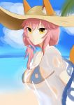  1girl absurdres animal_ears bad_id bad_pixiv_id bikini_top breasts cleavage fate/extra fate/grand_order fate_(series) fox_ears hat highres large_breasts leaning_forward long_hair looking_at_viewer ocean outdoors pink_hair see-through smile solo summer swimsuit tamamo_(fate)_(all) tamamo_no_mae_(swimsuit_lancer)_(fate) upper_body yellow_eyes 