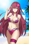  1girl absurdres beach bikini blurry_background breasts brown_hair cleavage fate/grand_order fate_(series) flower hair_flower hair_ornament highres large_breasts long_hair makise_medaka midriff navel purple_hair red_eyes scathach_(fate/grand_order) scathach_(swimsuit_assassin)_(fate) solo standing swimsuit thigh_strap 