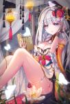  1girl artist_name bare_shoulders blue_eyes blush book braid breasts cleavage flower grey_hair hair_flower hair_ornament highres long_hair looking_at_viewer lotus parted_lips qurare_magic_library red_flower silver_hair single_braid sitting smile snow_is_ solo white_flower 