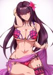  1girl bikini blush breasts cleavage fate/grand_order fate_(series) flower hair_flower hair_ornament highres kunai large_breasts long_hair looking_at_viewer navel o-ring_top purple_hair red_eyes sarong scathach_(fate/grand_order) scathach_(swimsuit_assassin)_(fate) shiny shiny_skin side-tie_bikini simple_background sitting smile solo swimsuit thigh_strap under_boob weapon webslinger 