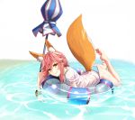  1girl afloat animal_ears bare_legs barefoot blush breasts brown_eyes cleavage close-up closed_mouth closed_umbrella fate/extra fate/grand_order fate_(series) fox_ears fox_tail full_body highres hinomoto_madoka innertube leg_up long_hair looking_at_viewer lying medium_breasts no_pants on_stomach outstretched_leg pink_hair scrunchie shirt simple_background smile solo tail tamamo_(fate)_(all) tamamo_no_mae_(swimsuit_lancer)_(fate) umbrella water wet wet_clothes wet_shirt white_background white_shirt wrist_scrunchie 