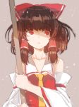  1girl arm_garter ascot bare_shoulders bow brown_hair collarbone detached_sleeves hair_bow hair_tubes hakurei_reimu holding_broom japanese_clothes looking_away miko parted_lips pokan_(xz1128) red_bow red_eyes solo touhou upper_body wide_sleeves 