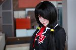 1girl black_hair cosplay date_a_live photo red_eyes school_uniform tokisaki_kurumi twintails 