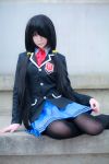  1girl black_hair black_legwear cosplay date_a_live pantyhose photo red_eyes school_uniform sitting skirt tokisaki_kurumi twintails 