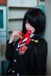  1girl black_hair cosplay date_a_live mouth_hold photo red_eyes school_uniform tokisaki_kurumi twintails 
