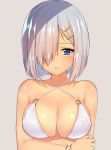  1girl bikini blue_eyes blush bracelet breasts cleavage collarbone commentary_request criss-cross_halter hair_ornament hair_over_one_eye hairclip halter_top halterneck hamakaze_(kantai_collection) jewelry kantai_collection large_breasts matarou_(genkai_toppa) o-ring_bikini parted_lips shiny shiny_skin short_hair silver_hair solo swimsuit white_bikini white_swimsuit 