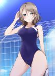  1girl :o bangs bare_arms blue_eyes blue_sky blue_swimsuit blush breasts brown_hair collarbone competition_swimsuit contrapposto covered_navel cowboy_shot eyebrows eyebrows_visible_through_hair eyelashes fence hair_between_eyes hand_up hip_bones holding lens_flare looking_at_viewer love_live! love_live!_sunshine!! one-piece_swimsuit outdoors seseri7th short_hair skin_tight sky solo sun swept_bangs swim_cap_removed swimsuit watanabe_you 