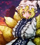  1girl animal_ears blonde_hair blush dress fox_ears fox_tail hands_in_sleeves hat long_sleeves looking_at_viewer mob_cap multiple_tails open_mouth outdoors pillow_hat reymu short_hair sky smile solo tabard tail tassel touhou upper_body white_dress wide_sleeves yakumo_ran yellow_eyes 