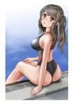  1girl ass bare_shoulders blush breasts brown_eyes brown_hair competition_swimsuit from_behind highres long_hair looking_at_viewer looking_back mashinatsu one-piece_swimsuit original poolside side_ponytail sideboob sitting solo swimsuit two_side_up 