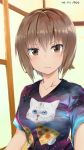  &gt;:/ 1girl 2016 blush brown_eyes brown_hair cat commentary_request dated food girls_und_panzer highres looking_at_viewer mokyutan nishizumi_maho pizza self_shot shirt short_hair solo space t-shirt tongue tongue_out upper_body 