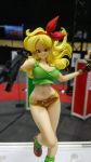  1girl bare_shoulders blonde_hair breasts dragon_ball female figure large_breasts legs long_hair lunch_(dragon_ball) photo shoes short_shorts shorts smile weapon 