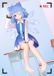 1girl :p absurdres barefoot blue_bow blue_dress blue_eyes blue_hair blue_necktie blush bow chair chinese_commentary cirno closed_mouth collared_shirt commentary_request desk detached_wings dress hair_bow highres ice ice_wings long_sleeves looking_at_viewer medium_hair necktie on_desk one_eye_closed pinafore_dress pointy_ears recording school_chair school_desk shirt sleeveless sleeveless_dress smile solo toes tongue tongue_out touhou viewfinder white_shirt wings wrainman 