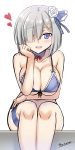  1girl alternate_costume bare_shoulders bikini blue_bikini blue_eyes blush breast_press breasts cleavage collarbone detached_collar flower front-tie_top hair_flower hair_ornament hair_over_one_eye hamakaze_(kantai_collection) head_rest heart highres kantai_collection large_breasts leaning_forward looking_at_viewer micro_bikini midriff navel open_mouth short_hair sideboob silver_hair sitting solo spoken_heart swimsuit the-sinner thigh_strap under_boob 