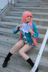  1girl akashiya_moka akashiya_moka_(cosplay) cosplay legs photo pink_hair rosario+vampire school_uniform solo thighs 