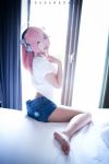  1girl ass barefoot brown_eyes cosplay curtains denim denim_shorts from_side headphones highres legs long_hair looking_at_viewer midriff nitroplus photo pink_hair shirt short_shorts shorts sitting smile soles solo super_sonico super_sonico_(cosplay) toes window 
