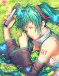  1girl artist_name blue_eyes breasts character_name detached_sleeves grass green_hair grey_shirt hair_ornament hatsune_miku heterochromia highres holding holding_microphone long_hair lying medium_breasts microphone on_side parted_lips red_eyes red_flower shirt sideboob sleeveless sleeveless_shirt solo tattoo twintails upper_body vocaloid yuket 