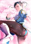 1girl ass black_hair boots bun_cover capcom cherry_blossoms chinese_clothes chun-li fighting_stance pantyhose petals solo spiked_bracelet street_fighter takemaru08 