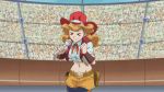  1girl animated animated_gif announcer belt breasts cowboy_hat female fringe happy hat holding_microphone large_breasts light_brown_hair melissa_claire microphone shirt smile stadium vest yu-gi-oh! yuu-gi-ou_arc-v 