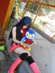  1girl blue_hair cosplay handheld_game_console hikari_(pokemon) hikari_(pokemon)_(cosplay) nintendo nintendo_3ds photo pokemon skirt 