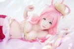  1girl blue_eyes breasts character_request cleavage cosplay lying on_side photo pink_hair solo tagme 