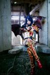  1girl akasha_the_queen_of_pain armor blue_hair boots breasts cleavage cosplay defense_of_the_ancients dota dota_2 horns legs_crossed lipstick long_hair makeup navel photo red_eyes sitting tagme thigh_boots torn_clothes wings 