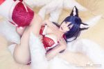  1girl animal_ears breasts cosplay fox_ears league_of_legends multiple_tails panties photo tail underwear 