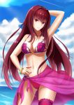  1girl arm_up bikini bracelet breasts cleavage cowboy_shot day fate/grand_order fate_(series) jewelry large_breasts long_hair looking_at_viewer nail_polish navel ocean outdoors purple_hair purple_nails randoru red_eyes revision sarong scathach_(fate/grand_order) scathach_(swimsuit_assassin)_(fate) sky smile solo swimsuit 