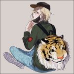  1boy backpack bag baseball_cap black_border blonde_hair border green_eyes hat highres indian_style jacket leopard_print looking_back male_focus mask_pull sitting surgical_mask tiger tongue tongue_out yamada_chickenko yuri!!!_on_ice yuri_plisetsky 