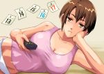  1girl bored breasts brown_hair calendar large_breasts lying original short_hair solo tomoshiki 
