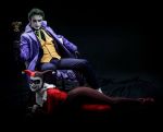  1boy 1girl alyssa_king anthony_misiano batman_(series) bodysuit chair cosplay dc_comics domino_mask formal gloves harley_quinn hat jacket jester_cap lying mask on_stomach photo pinstripe_pattern sitting smile staff suit the_joker waistcoat 