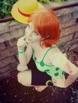  1girl breasts camisole cosplay nami_(one_piece) nami_(one_piece)_(cosplay) one_piece orange_hair photo shorts solo 