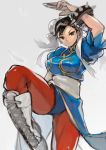  1girl black_hair blue_dress boots bracelet brown_eyes bun_cover china_dress chinese_clothes chun-li cross-laced_footwear double_bun dress earrings highres jewelry puffy_short_sleeves puffy_sleeves shigi_0 short_sleeves solo spiked_bracelet spikes street_fighter white_boots 