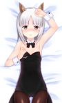  1girl animal_ears armpits arms_up bed_sheet black_legwear blush bow bowtie brave_witches brown_eyes bunnysuit dakimakura detached_collar edytha_rossmann fox_ears from_above leotard looking_at_viewer lying medal okina_ika on_back short_hair silver_hair strike_witches world_witches_series wrist_cuffs 