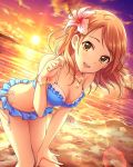  1girl beach bent_over bikini bracelet breasts brown_eyes brown_hair cleavage flower frilled_bikini frills hair_flower hair_ornament houjou_karen idolmaster idolmaster_cinderella_girls jewelry necklace official_art open_mouth side-tie_bikini smile solo sunset swimsuit water 