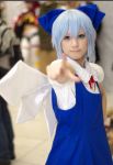  1girl asian blue_hair blurry bow cirno cirno_(cosplay) cosplay depth_of_field female photo solo touhou wings 