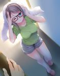  1girl black-framed_eyewear blue_eyes blush breasts brown_hair commentary_request green_shirt grey_hair komone_ushio large_breasts looking_at_viewer love_live! love_live!_sunshine!! one_eye_closed salute shirt short_hair short_sleeves shorts smile solo towel towel_on_head watanabe_you 