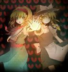  2girls alice_margatroid belt blonde_hair blue_dress book capelet dress female frills glowing green_eyes grimoire hat heart kirisame_marisa looking_at_viewer magic multiple_girls necktie outstretched_arm puffy_short_sleeves puffy_sleeves red_necktie sakusakumonoka short_sleeves symmetry touhou waitress witch_hat yellow_eyes yuri 