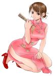  1girl bare_shoulders breasts brown_eyes brown_hair bucho china_dress chinese_clothes closed_fan dress fan folding_fan high_heels kneeling shoes side_slit simple_background smile solo 