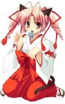  1girl animal_ears cat_ears japanese_clothes miko mouse new_year red_hakama solo twintails 