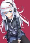  1girl absurdres anchor_symbol black_legwear blue_eyes blue_hair blue_skirt blush camouflage_jacket closed_mouth collarbone commentary_request earmuffs flat_cap fur-trimmed_jacket fur_trim hammer_and_sickle hat hibiki_(kantai_collection) highres jacket kantai_collection long_hair long_sleeves odeclea pantyhose pleated_skirt red_background simple_background sitting skirt sleeves_past_wrists solo star verniy_(kantai_collection) very_long_hair white_hat 