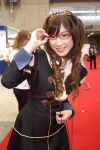  1girl brown_hair cosplay curly_hair glasses long_hair photo red-framed_glasses smile solo_focus tiara 