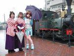  3girls animegao cosplay ground_vehicle japanese_clothes kigurumi locomotive miko multiple_girls photo sabrina steam_locomotive train umbrella yagasuri zentai 