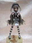  1girl figure gothic_lolita lolita_fashion lowres nagato_yuki pantyhose photo solo striped striped_legwear suzumiya_haruhi_no_yuuutsu 